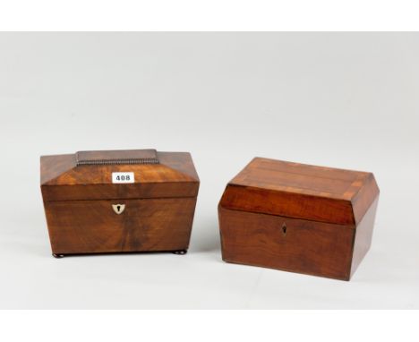 A Victorian mahogany sarcophagus shaped tea caddy with twin lidded interior, mother of pearl escutcheon, standing on turned b