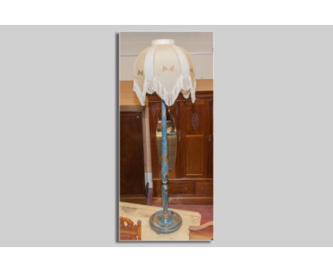 A blue chinoiserie decorated standard lamp and velum shade, 183 cms tall