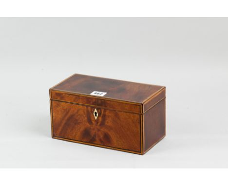 A Georgian mahogany tea caddy with ivory diamond shaped escutcheon and ebony and boxwood edge stringing, twin interior lidded