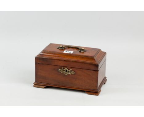 A Georgian mahogany three division tea caddy with brass carrying handle and escutcheon on bracket corner feet, the velvet lin