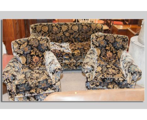 A good Art Deco three piece upholstered lounge suite comprising a two seater drop arm couch and pair of armchairs all with fo