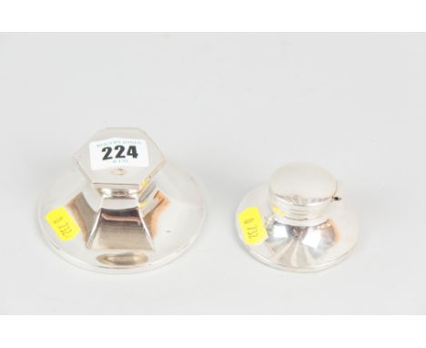 A circular silver inkwell, marks indistinct but believed Birmingham 1913 and a smaller silver inkwell, Birmingham 1911