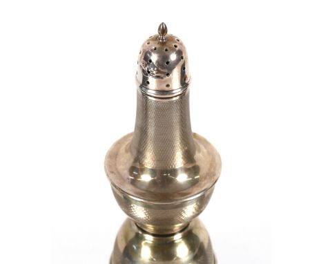 A silver baluster sugar shaker with engine turned decoration, Birmingham 1934, 16cm high&nbsp;