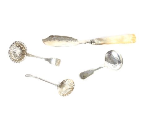 A Georgian silver sifter spoon, marks indistinct; a Victorian similar, Sheffield 1886; a plated caddy spoon; and a silver and