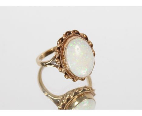 A 9ct gold opal set dress ring, 4gms Size M/N