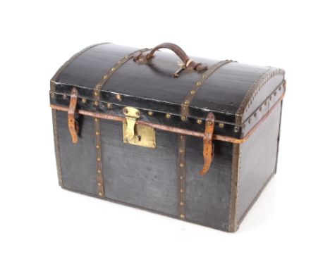 A domed leather and brass mounted travelling trunk, 46.5cm long