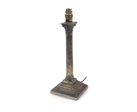 A silver Corinthian column candlestick, with presentation inscription presented to Captain E.R.C. Wyatt on his marriage by th