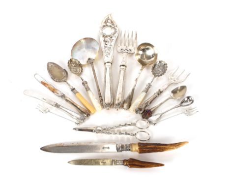 A collection of miscellaneous plated cutlery to include preserve spades, fish servers, plated toddy ladle, teaspoons, serving