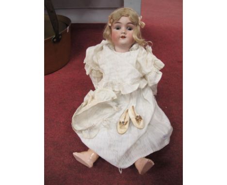 An Early XX Century Bisque Headed Doll by Handwerck (Germany), composition jointed body, brown eyes, open mouth, teeth presen