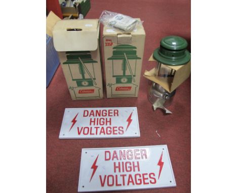 Coleman Model 3358 Storm Lamp x 2, both boxed, two "Danger High Voltage" Signs. (4)