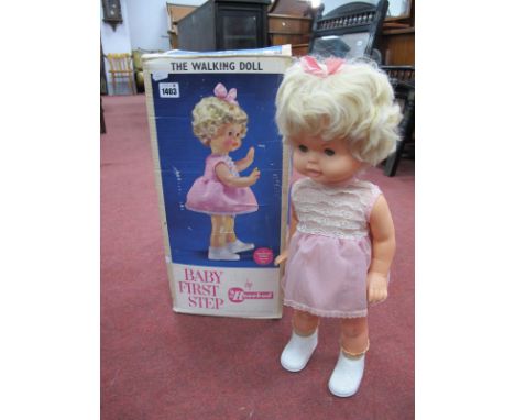 A Rosebud Battery Operated 'Baby First Step' Doll, boxed.