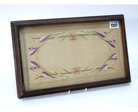 An Early XX Century Embroidered Panel on Silk, in mahogany frame, 35cm x 22cm.