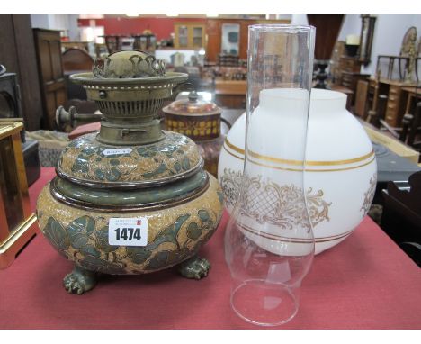 Doulton Lambeth Stoneware Lamp, 'EDL possibly Edith Lupton, of squat circular form with allover leaf decoration on three paw 