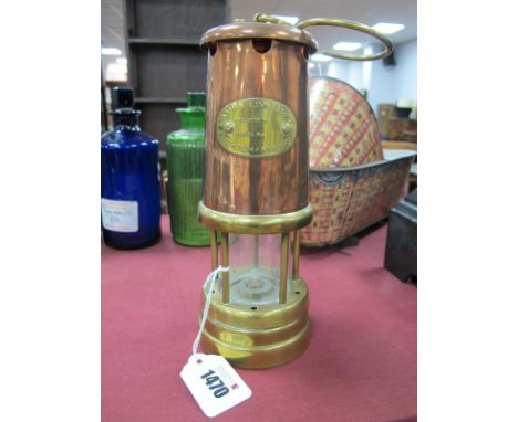 Lamp &amp; Limelight Company Hockley Miners Lamp, in brass and copper, 22cm high with handle down.