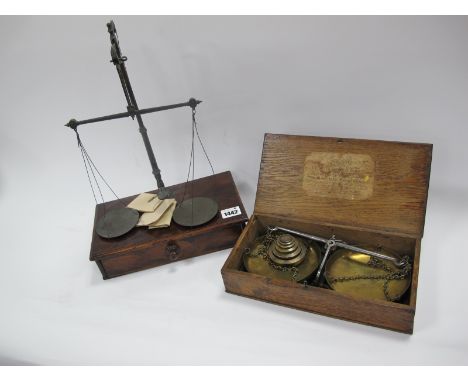 A Mid XIX Century Balance Scale and Weights, in an oak case with label for 'De Grave, Short and Fanner'; Another, mounted on 