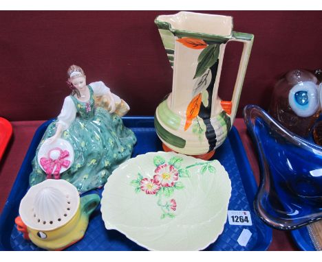 A Doulton 'Elyse' figurine, Moyott jug vase, lemon squeezer, Carlton dish (chipped):- One Tray.