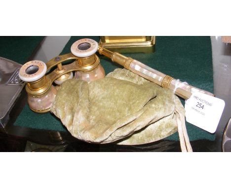 A pair of La Reine French gilt metal and Mother-of-Pearl opera glasses 