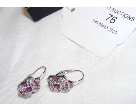 A pair of white gold diamond and ruby earrings in the Art Deco style CONDITION REPORTEarring face approximatley 10mm by 8mm