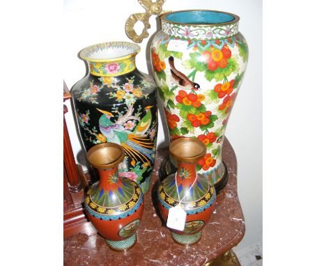 A 40cm high cloisonne vase on stand, together with a pair of 23cm high cloisonne vases , and a ceramic oriental vase.