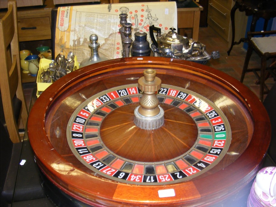 A full sized 32" diameter UK casino roulette wheel circa 1970's