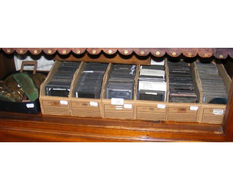 A quantity of magic lantern slides - mostly religious, together with Bausch & Lomb bookends CONDITION REPORTTheme of slides i