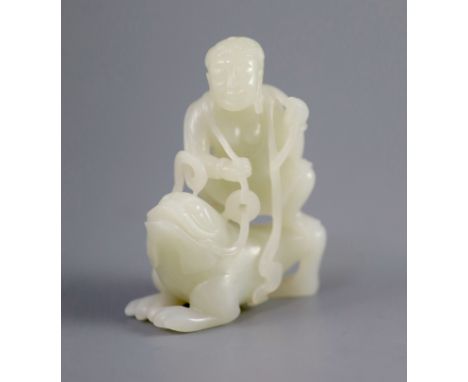   A good Chinese pale celadon jade group of Liu Hai and the three legged toad, 18th century,finely carved with the figure of 