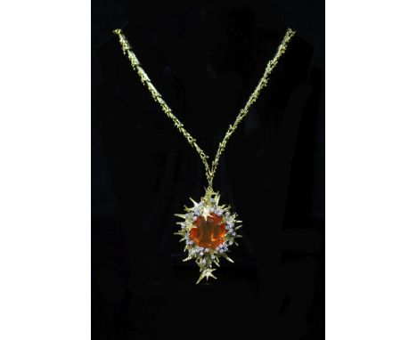   A stylish 1970's George Weil 18ct gold, platinum, fire opal and diamond set shaped oval pendant clip brooch, on an 18ct gol