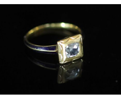   A 19th century gold, blue enamel and old mine cut diamond set ring,size L, gross weight 3.4 grams.