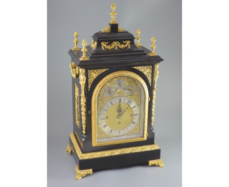   A large late Victorian ormolu mounted bracket clock,the dial with black Roman numerals, surrounded by pierced scrolling spa