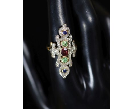   A 20th century ornate gold, garnet, peridot, sapphire and diamond chip set up-finger dress ring,size P, gross 9.4 grams.