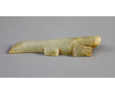   A Chinese archaic celadon jade figure of a crocodile,the stone with some slight russet inclusions to one end,6.1 cm 