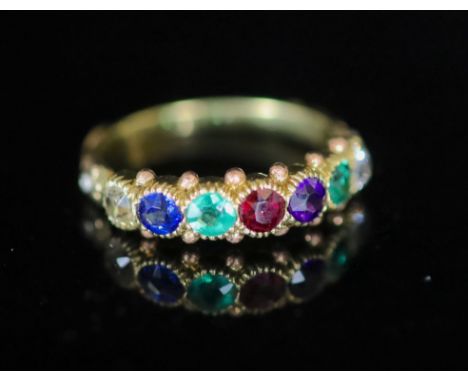   A 19th century gold and multi gem set ‘Dearest’ half hoop ring,with milled setting and carved and diamond chip set shoulder