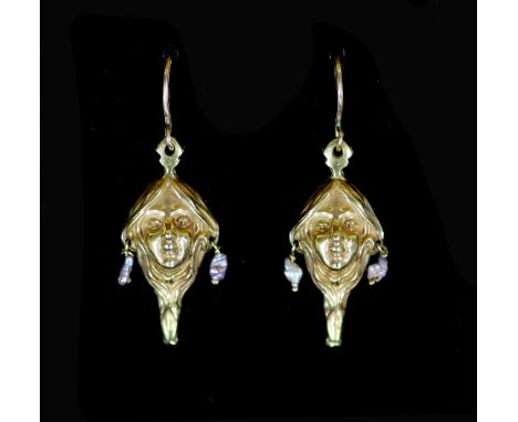   A pair of Art Nouveau gold and baroque pearl set drop earrings,modelled as the face of a lady, 33mm excluding ear wire, gro