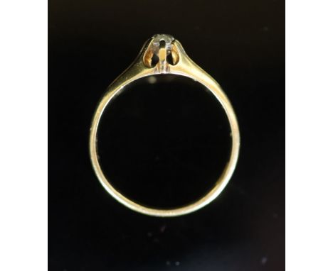   A mid 20th century 18ct gold and claw set oval cut solitaire diamond ring,the stone very approximately estimated as 0.35ct-