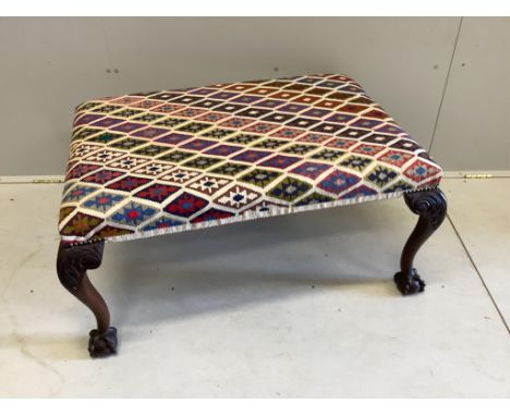 A Chippendale revival mahogany stool with Kelim upholstered seat, width 97cm, depth 67cm, height 47cm. Condition - good