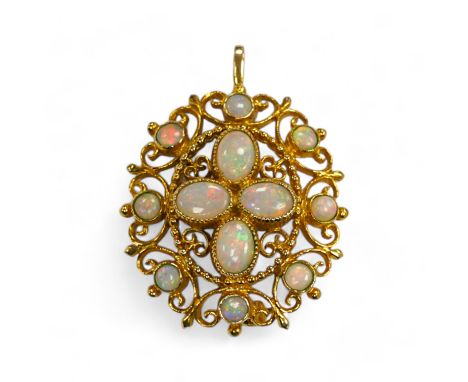 A modern 9ct gold and white opal cluster set oval pendant brooch, 33mm, gross weight 8.7 grams. Condition - fair to good