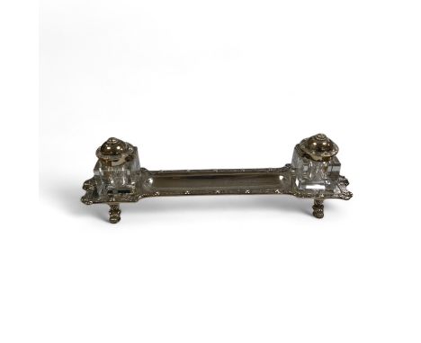 A modern silver inkstand with Celtic border and two mounted glass wells, Adie Bros. Birmingham, 1962, 26.3cm, 6.5oz. Conditio