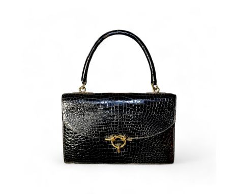 A Hermès vintage Cordeliere black crocodile handbag, the bag features a crocodile looping shoulder strap with polished gold l