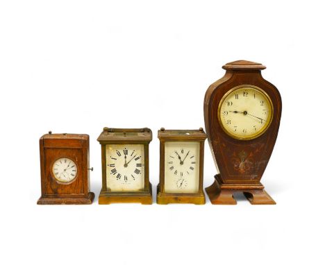 Two carriage clock, an Edwardian mantel clock, 25cm high, and a watch mounted in an oak case (4). Condition - fair, not teste