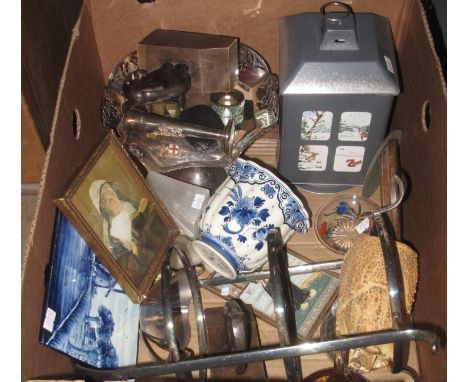 Box of oddments to include; Delft blue and white tile, alabaster book ends in the form of parrots, silver plated cake stand e