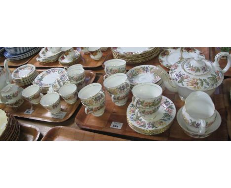 Two trays of Paragon fine bone china 'country lane' design teaware to include; teapot, cups, saucers, plates etc. (2) (B.P. 2