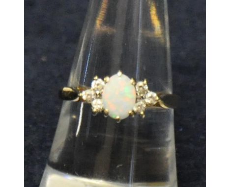 9ct gold opal ring. Size O. Approx weight 2.2g. (B.P. 21% + VAT)&nbsp;Opal measures approximately 7 x 5 mm. Condition is good