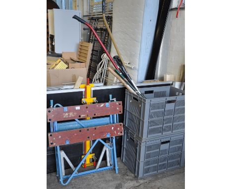 Collection of garden tools including a spade and a fork, together with a folding workman's or carpentry bench.(B.P. 21% + VAT
