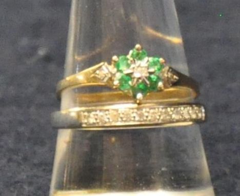 9ct gold emerald and diamond cluster ring, size P and a 9ct white gold diamond half eternity style ring. Size R. Approx weigh