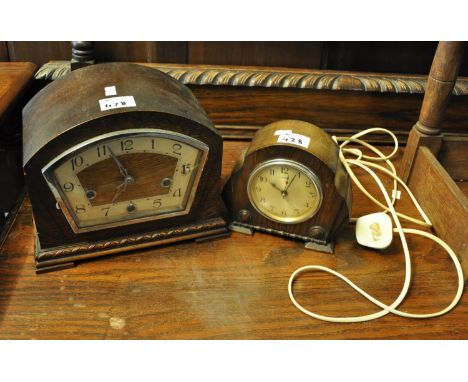Art Deco design oak cased electric mantel clock marked Ferranti, together with another Art Deco oak three train mantel clock.