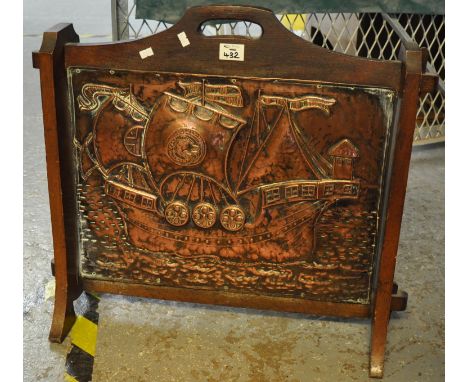 Arts and Crafts design copper repousse firescreen in the form of a Spanish galleon. (B.P. 21% + VAT)