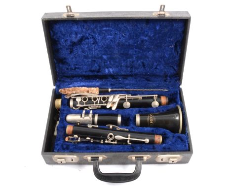 Corton clarinet, silver plated mounts, cased.