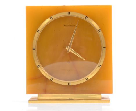 Jaeger LeCoultre 8-day mantle clock, square case in amber-toned bakelite (?), gilt metal chapter ring and stepped foot, 14.5c