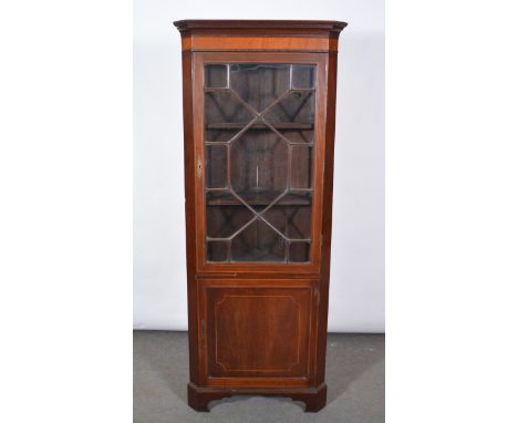 Victorian inlaid mahogany freestanding corner cabinet, key and cavetto cornice, the upper section with astragal glazed door e