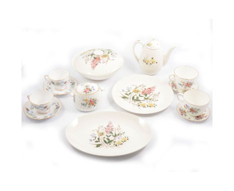 A Ridgway 'English Garden' part dinner and coffee service, comprising lidded tureens, plates, coffee pot (18cm), cups and sau